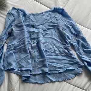 Light blue polyester crop top size medium